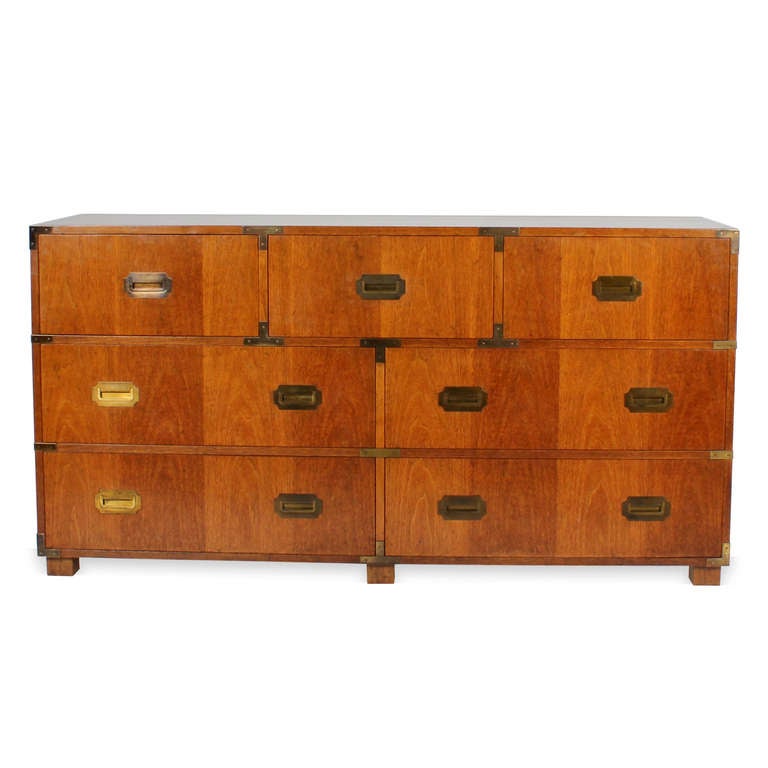 A campaign style long dresser or chest with 7 drawers, on a slightly raised block foot. Brass hardware. Mahogany.

Campaign is a specialty...fshenemaderantiques.com