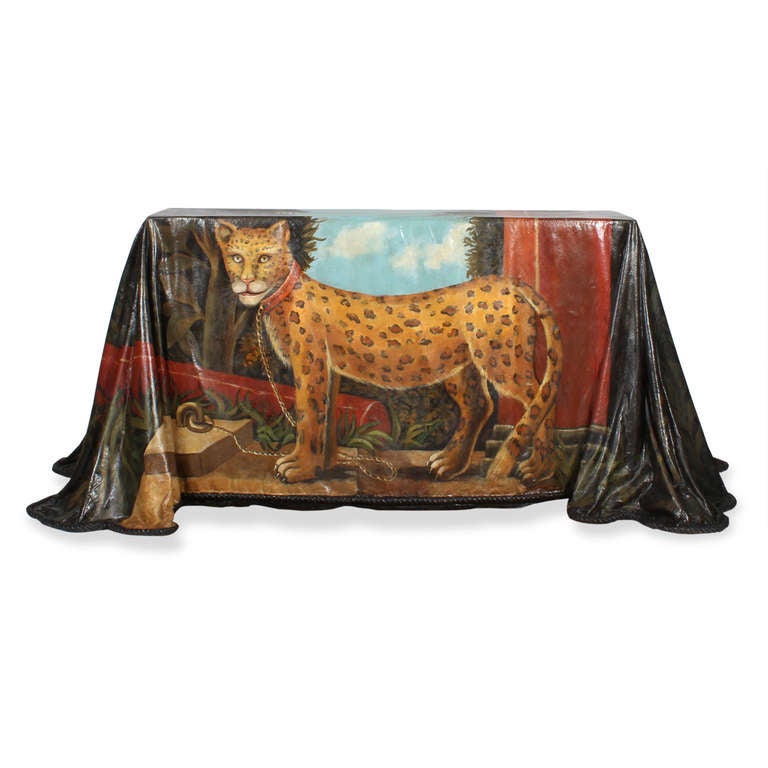 A great fanciful painting of a leopard with collar, a neoclassical column on a foliage and blue sky background, the reverse showing the foliage background, sky and column, all on a faux table cloth, with roped edges. Fiberglass. Signed Baxter, on