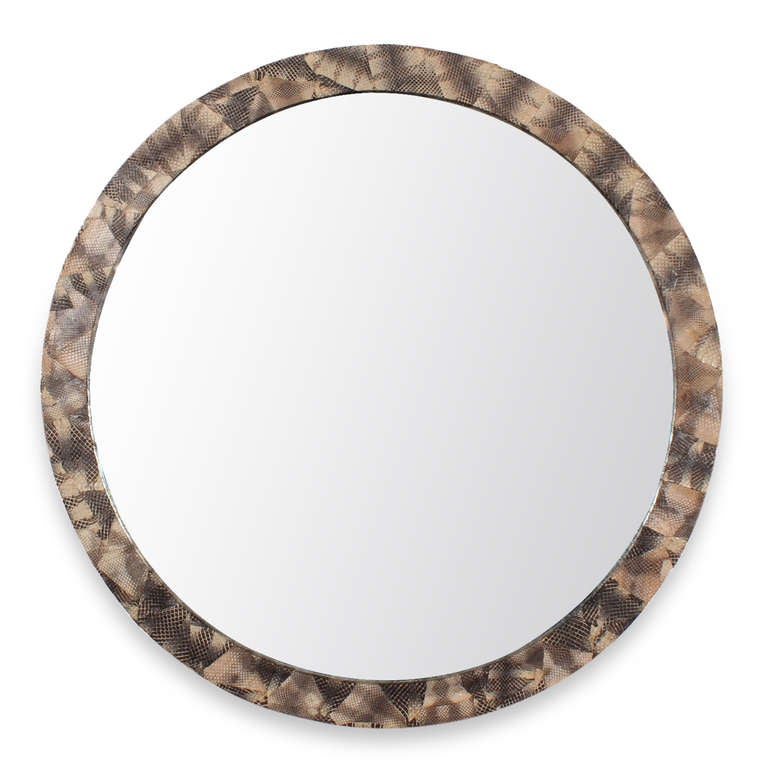 With a play on negatives and geometric shapes, this two-part python snake skin mirror, conceived in the manner of Karl Springer mirror is bold and decorative. The mirrors can be mounted closer together or farther apart allowing for a free decorative