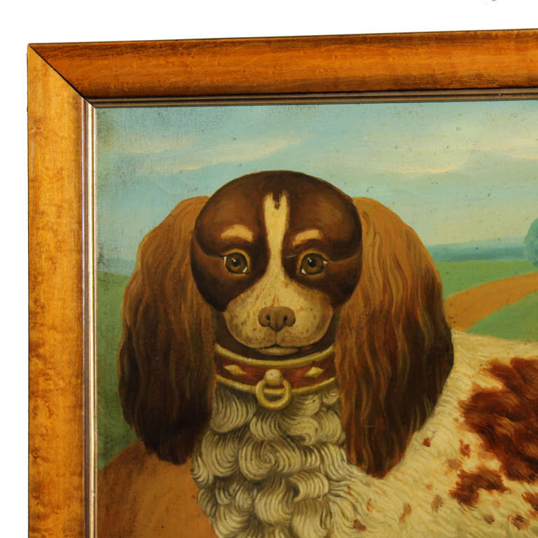 A beyond charming oil on canvas painting of a King Charles Spaniel with collar and a fine Georgian house. Great colors and subject matter. Original varnished frame.