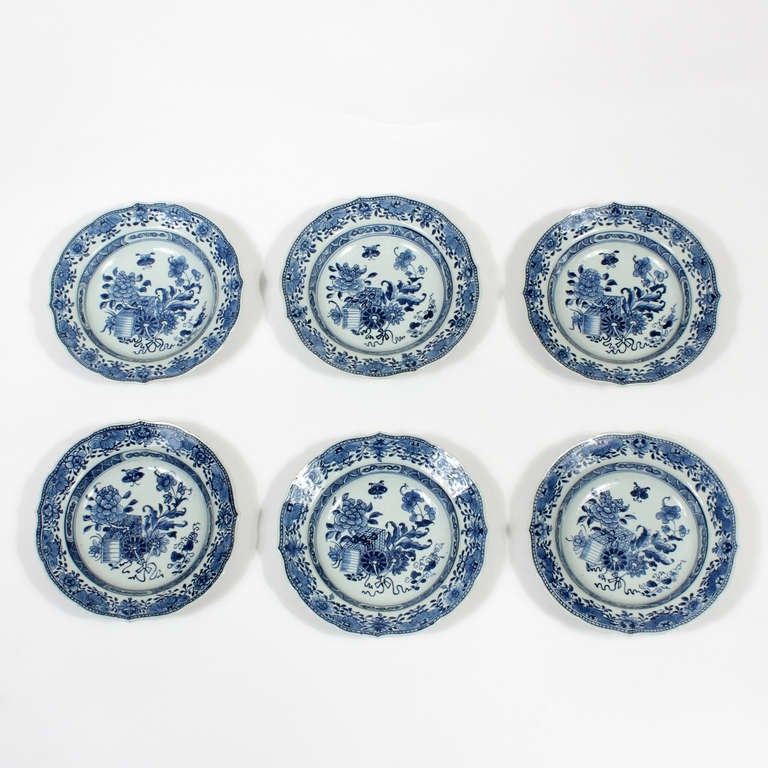 A set of 6, scalloped edge, 18th C. Chinese export blue and white Qianlong bowls, well drawn with a floral and insect design.
4 in mint condition, 2 with chips.