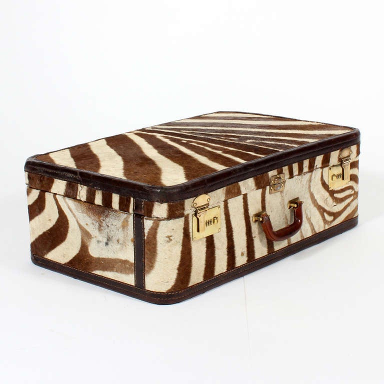 One of a group of 4 zebra suitcases custom made for Scottish textile heiress and American socialite  Nane Brennen (Borland) who shot the animal in Africa and had the luggage custom made for her in London in 1940s. These suitcases embody the