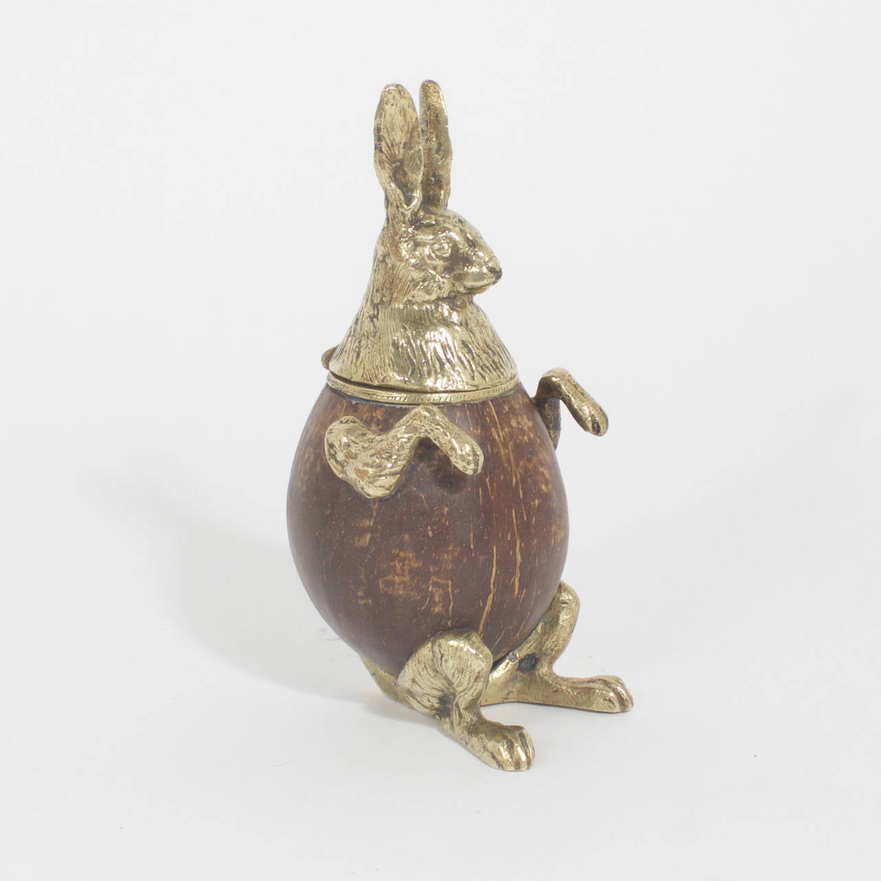 Pair of amusing Arthur Court trinket boxes or inkwells with brass rabbit heads, legs and arms. One having turned wood body the other a coconut bodyy. Signed Arthur Court and dated 1977 on the bottom of one rabbit. For sale individually at $575 each.
