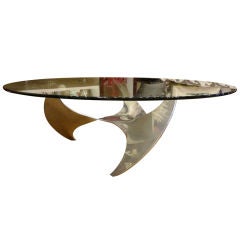 A Glass Top and Aluminum Propeller Coffee Table