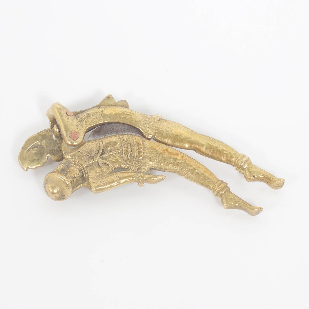 As if flying with a muse this Antique Indian cast brass cigar cutter fits into a flight of fancy. Form is meeting function in a dance for the ages. Add this one to your collection or just enjoy this object of art.