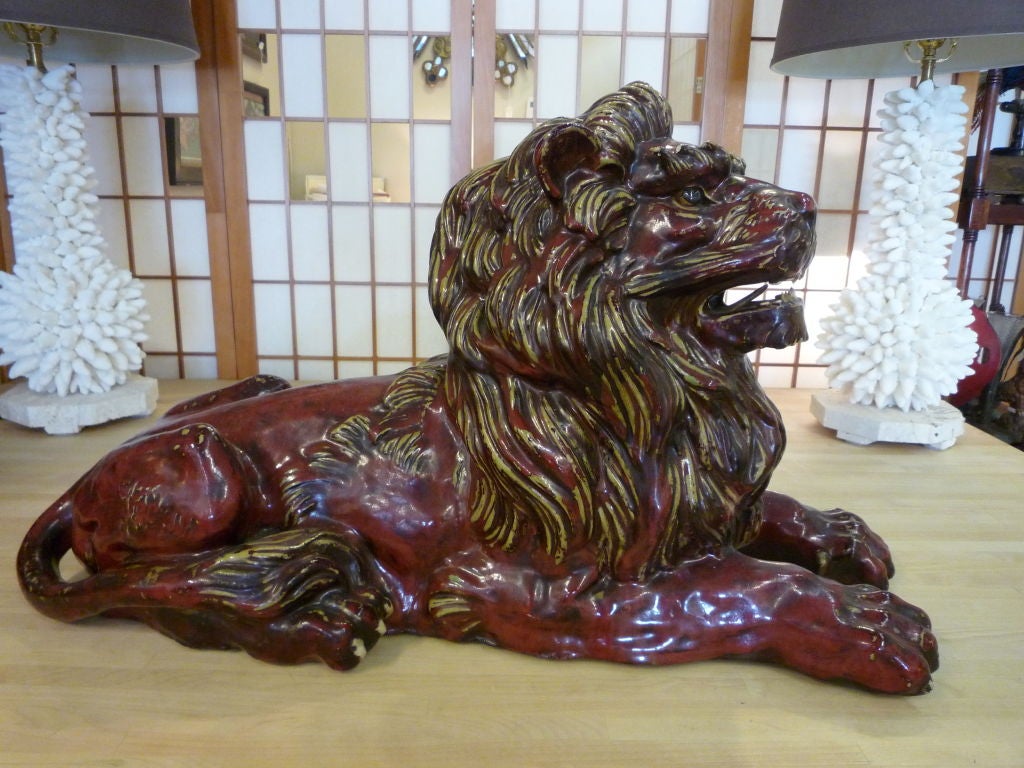 Pair of Early 20th Century Glazed Stoneware Hand Formed Lions In Excellent Condition In Palm Beach, FL