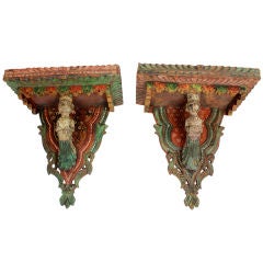 Pair of Carved and Painted Wood Figural Indian Brackets