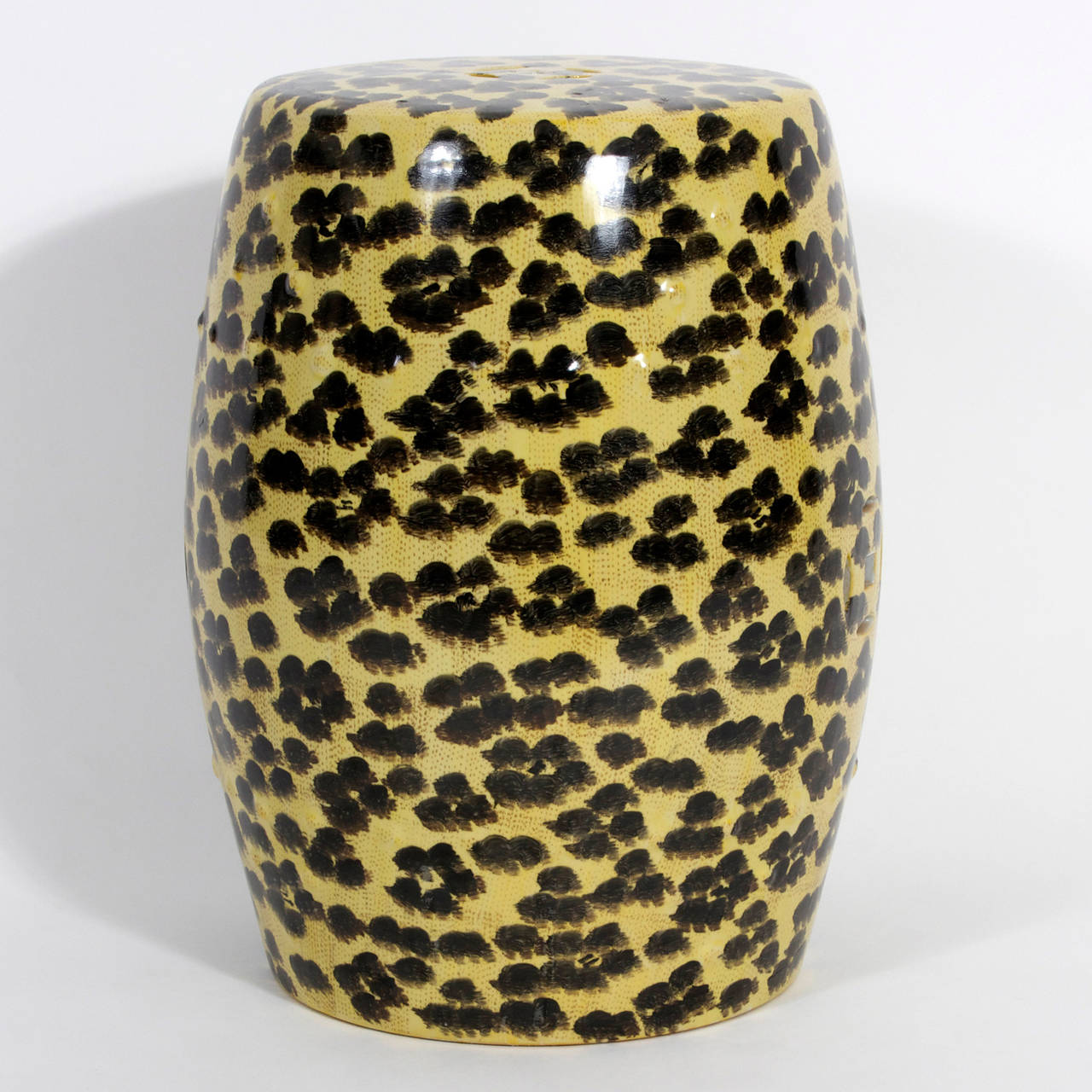 Bold and beautiful porcelain classic form garden seat with hand-painted leopard print pattern. Used as a seat or drink stand for a traditional or modern interior.