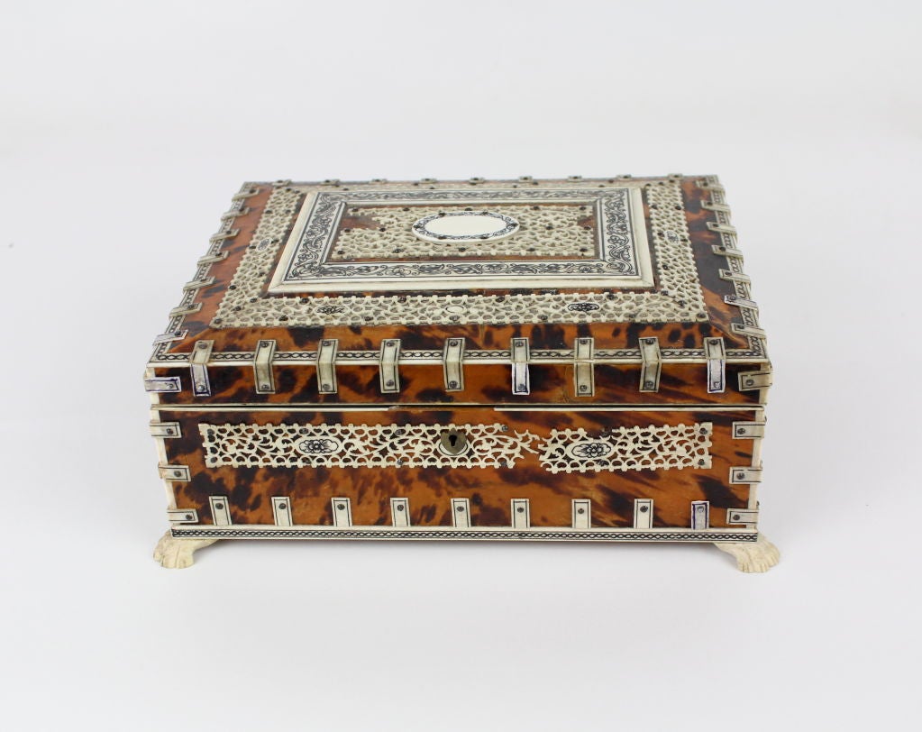 A huge (in tortoise shell box standards) Anglo Indian tortoiseshell and ivory box. Some missing ivory on the lid and the front of the box. Extremely rare size.