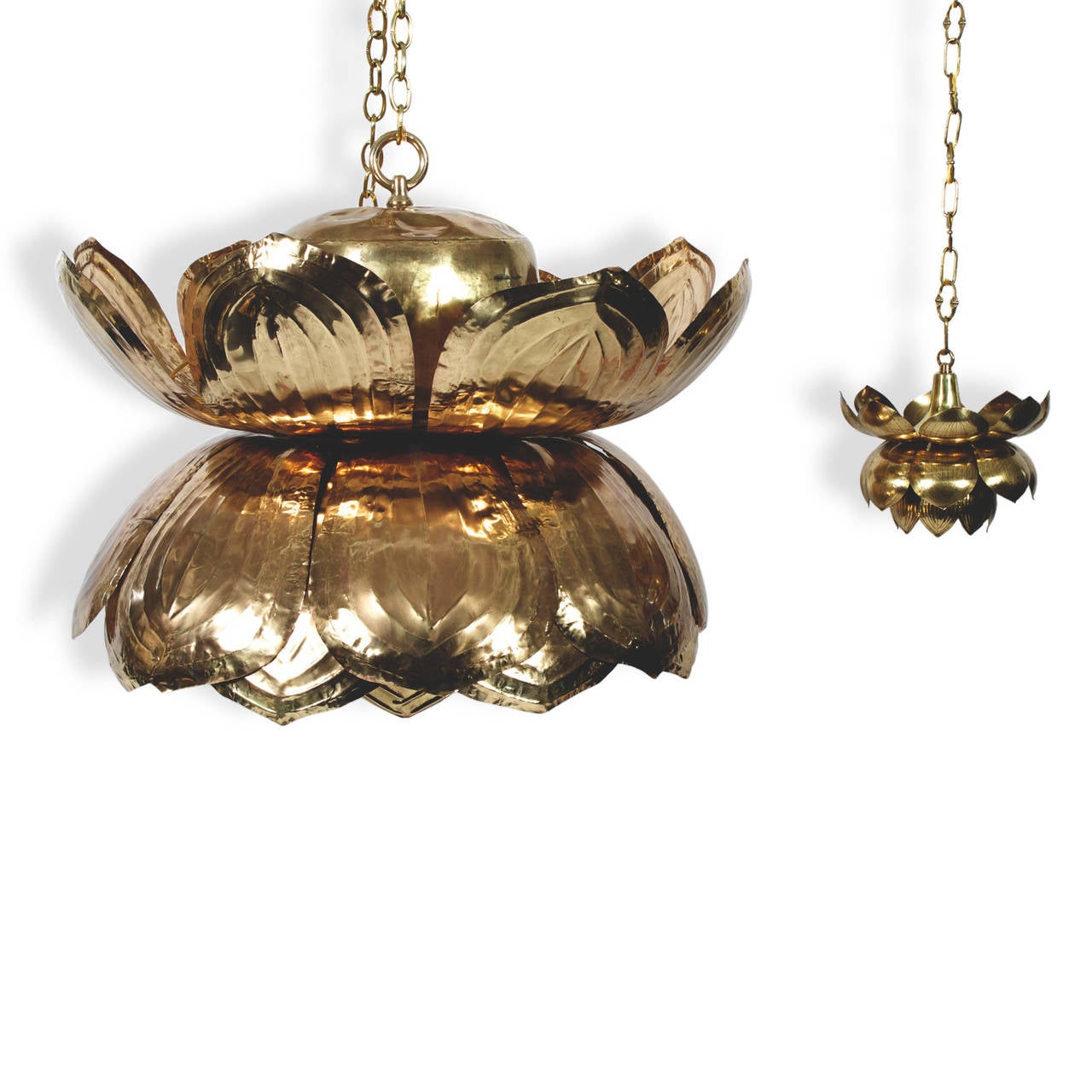 An exceptional large, custom hand-hammered, solid brass lotus chandelier or pendant light. This Mid-Century fixture is handsome and bold. A modern take on an ancient form, drawn from nature, will work in a variety of settings and be the focal point