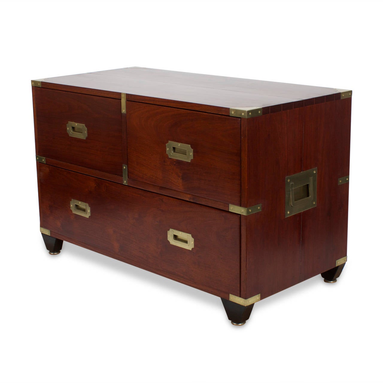 Charlotte Horstmann Campaign style chest made from in rich colored mahogany with ebonized tapered legs and Classic brass hardware. Labelled Charlotte Horstmann, Hong Kong. Newly polished.