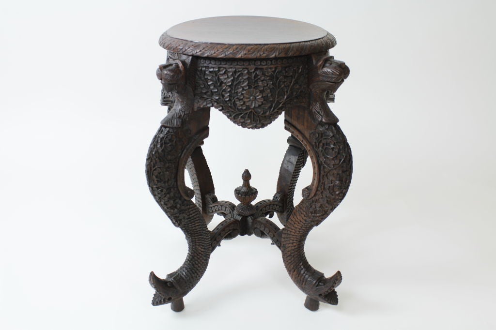 A Bombay blackwood Anglo Indian low table or plant stand, with very detailed carving, in excellent condition.<br />
<br />
Please check out our website at fshenemaderantiques.com