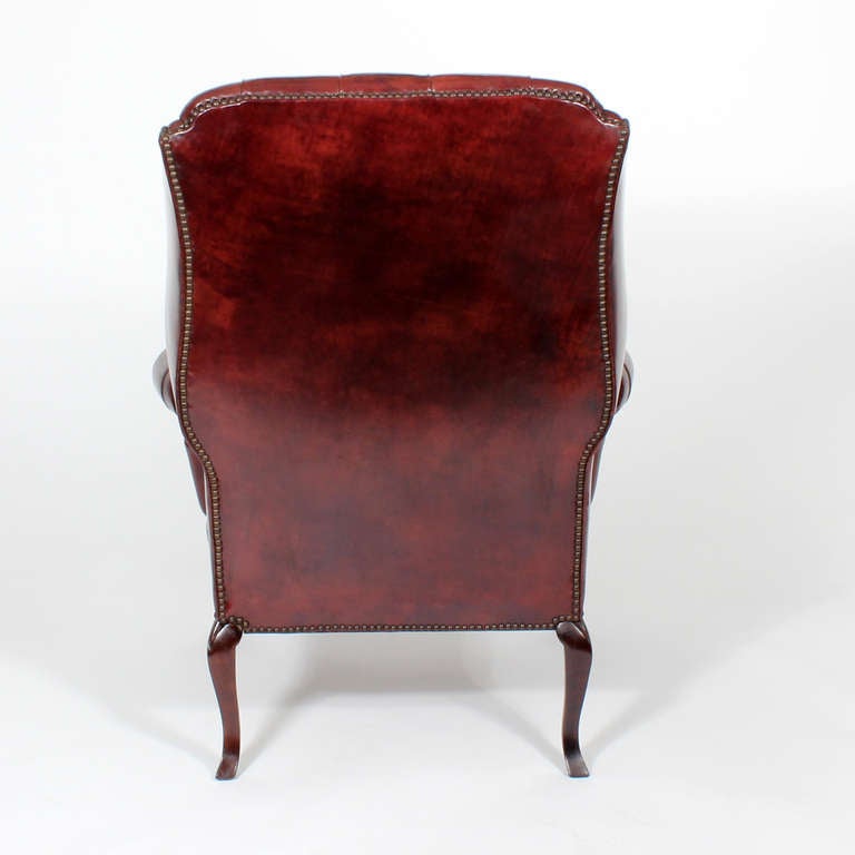 Pair of Red Leather Tufted Wing Chairs 1