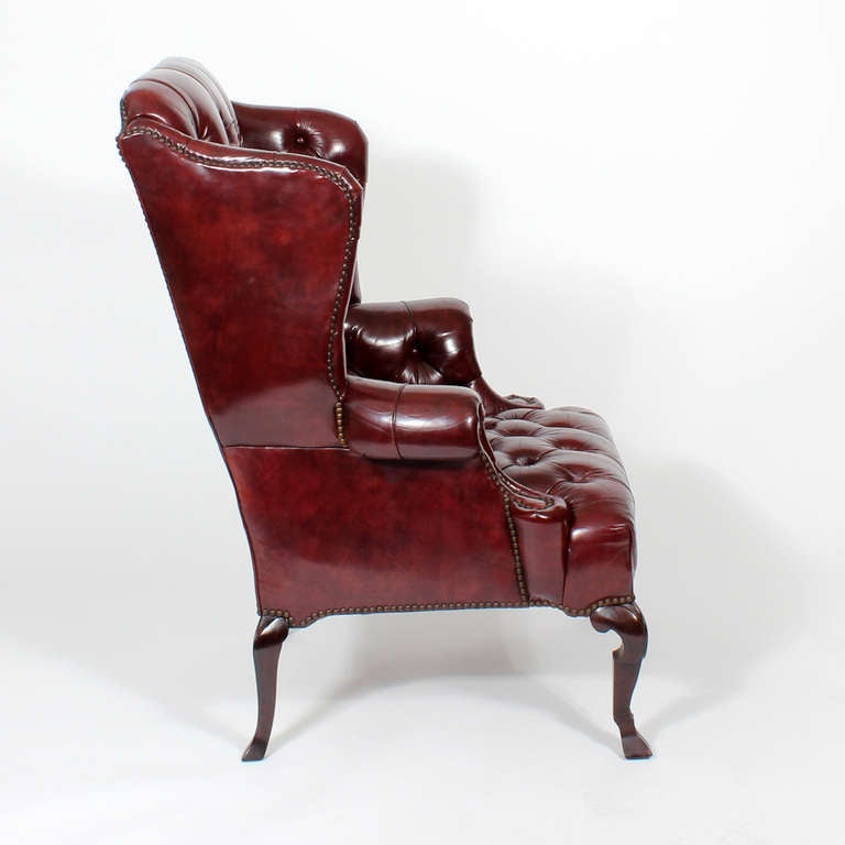 Late 20th Century Pair of Red Leather Tufted Wing Chairs