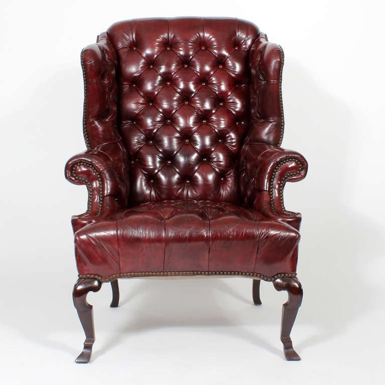 red leather tufted chair