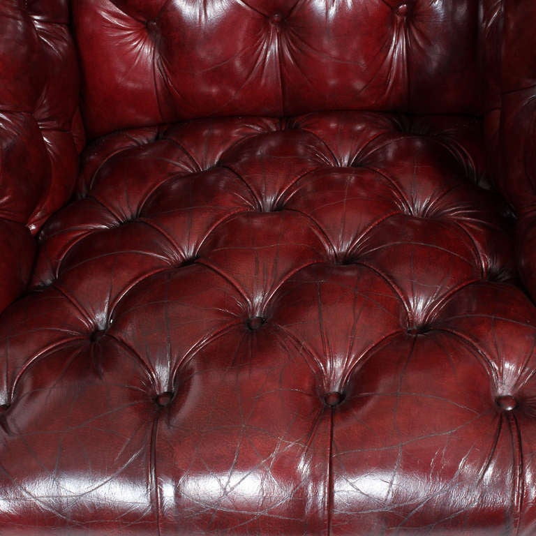 English Pair of Red Leather Tufted Wing Chairs