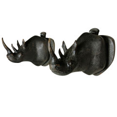Pair of Carved and Painted Wood Rhinoceros Head Mounts