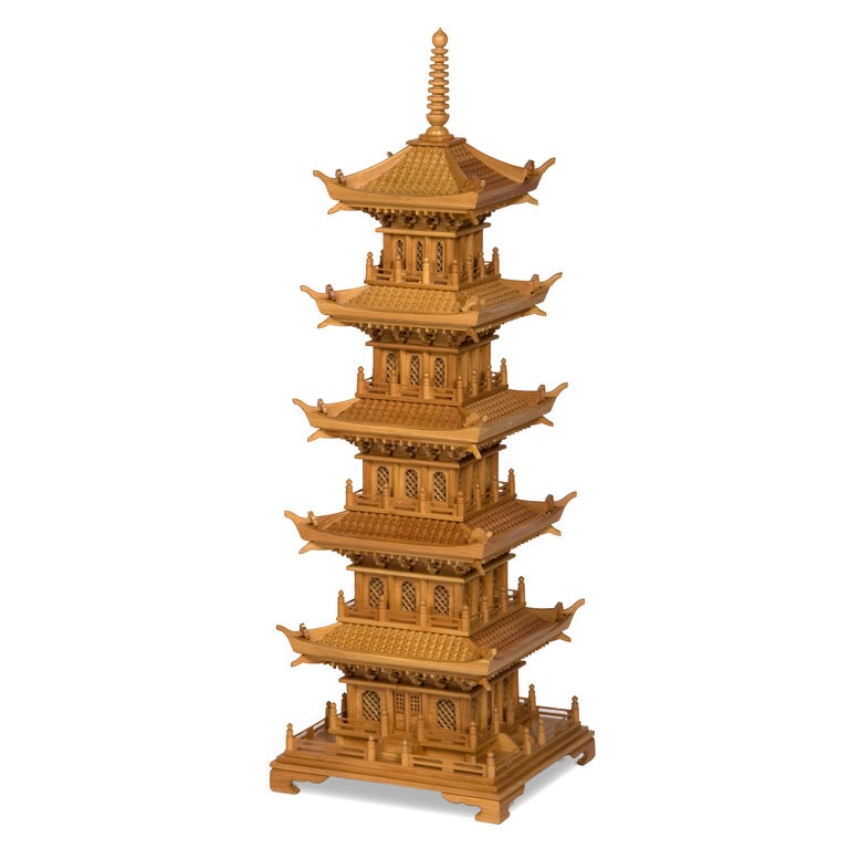 A pair of large pine pagodas, with lattice work windows, operating doors, multi-tiered tiled roofs, carved corbels and bracket bases. Pagodas are very fanciful and very hard to find in such an impressive size.



 