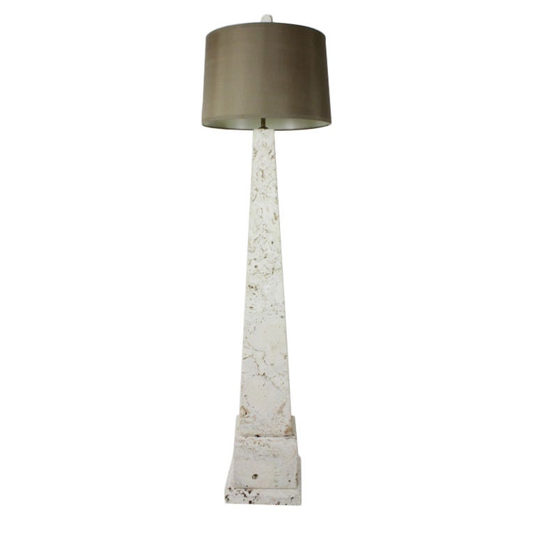A Mid-Century Modern Florida coquina stone floor lamp, three parts, for easy management, topped with a coquina stone finial. Ancient shell impressions are visible in the stone. Newly wired. 

