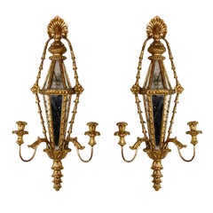 Pair of Carved and Gilt Mirrored Italian Wall Sconces