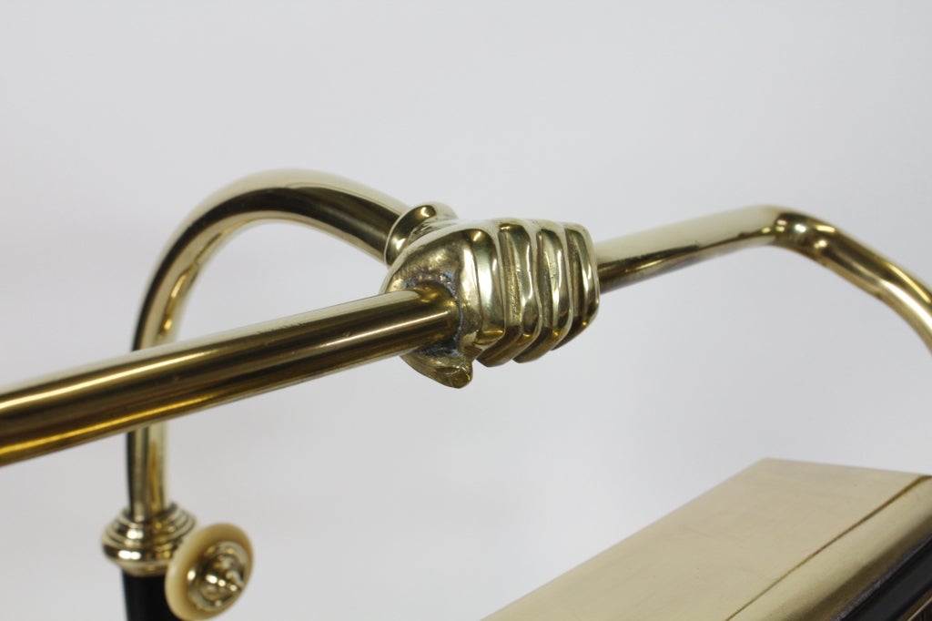 A Large Rectangular Shaped Brass Desk Lamp with Fist 2