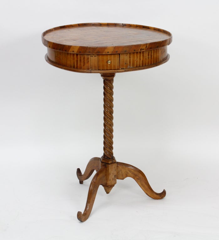 A very small and sweet 3 drawer Italian checkerboard top candle stand or games table, with a spiral turned column and up turned feet. Three names are etched into the very decorative inlaid top. Diagonal inlay decorates the edge of the top. This is a