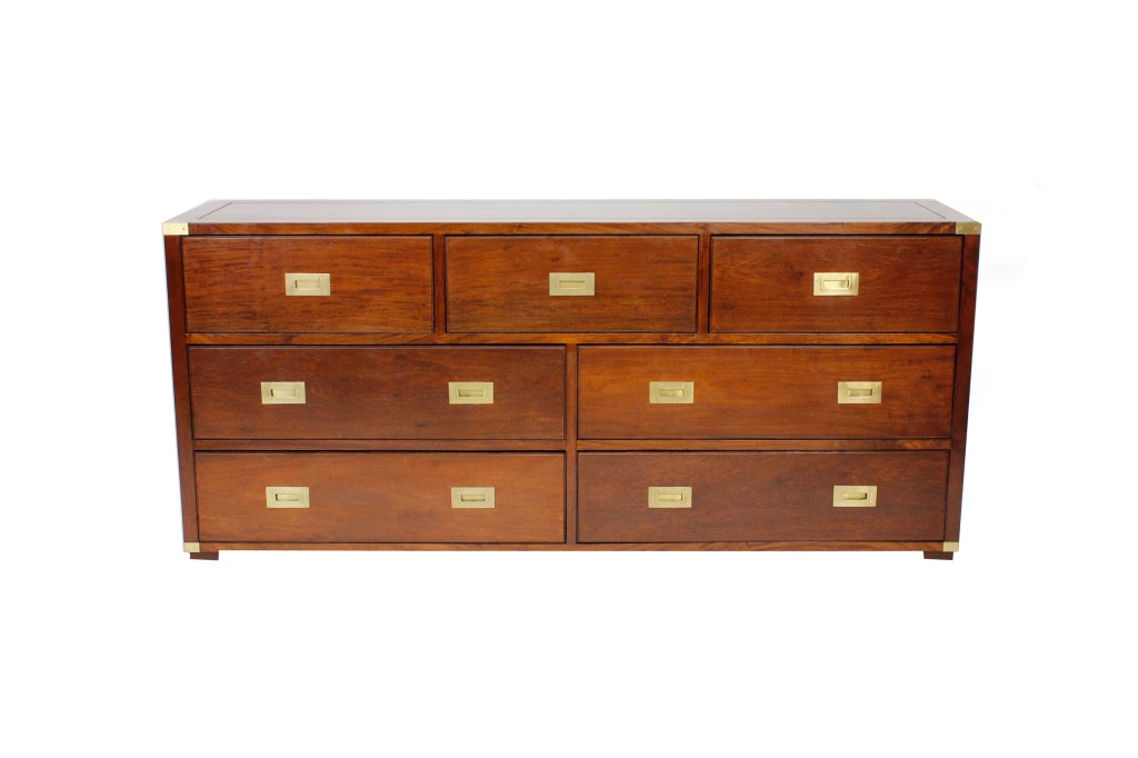 A campaign style 7 drawer sideboard or double dresser, brass hardware, carrying handles and a finished panel back.
Please visit our extensive website for other examples of campaign furniture. fshenemaderantiques.com