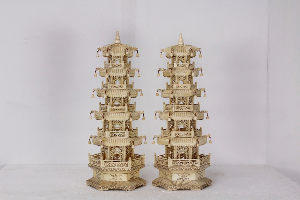 A pair of delightful carved bone pagodas, with wonderful details, including carved galleries and bells. Please see our website for a single carved bone pagoda, at fshenemaderantiques.com