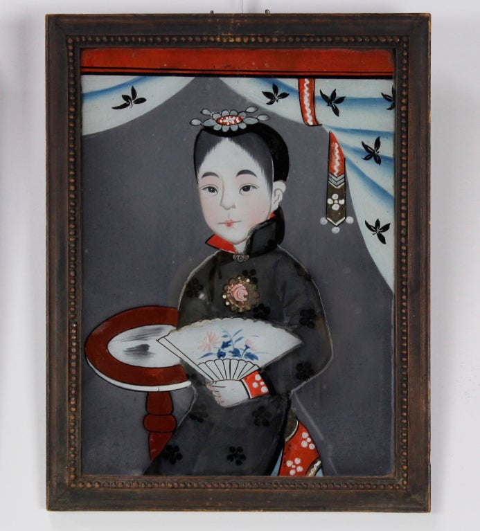A pair of super charming, Chinese reverse glass paintings, of young women, with their original frames.

