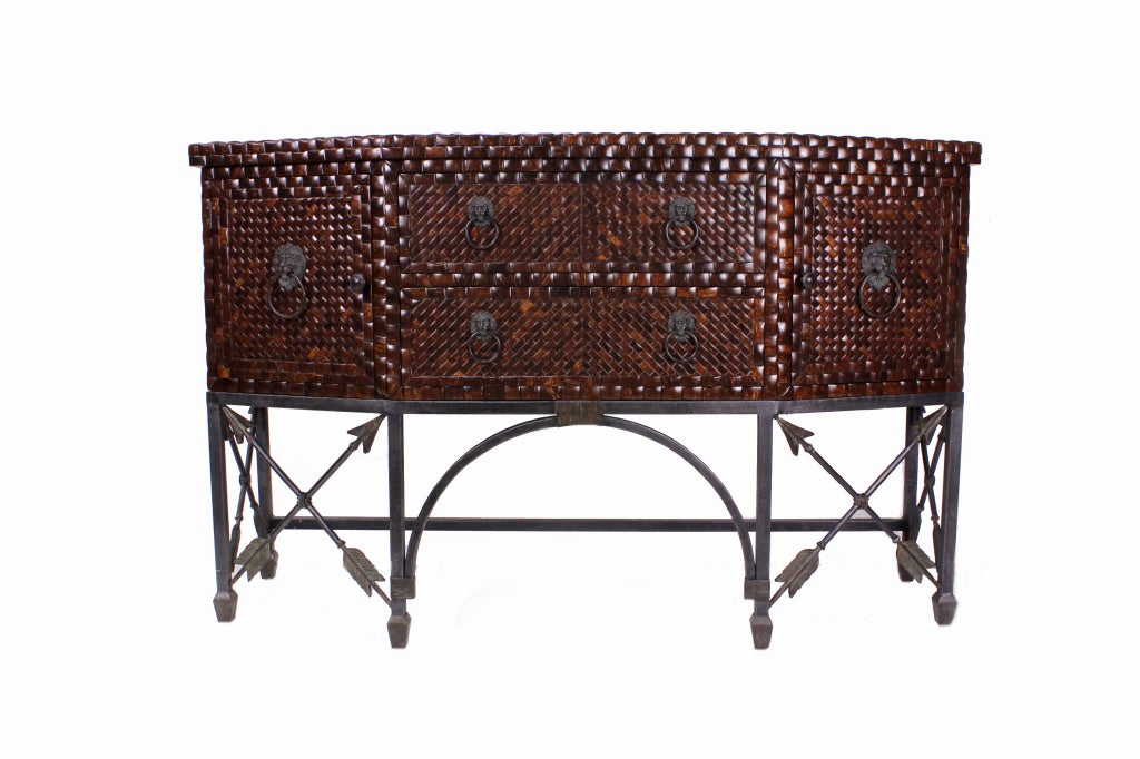 A very decorative, neoclassical style sideboard, with coconut shell squares on mahogany forming a basket weave pattern,a hand cut copper top,an iron base and lions head pulls. Labeled in brass, Maitland Smith, Hand Made in Philippines, on the back