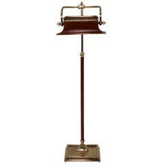 A Leather and Brass Floor Lamp by Chapman