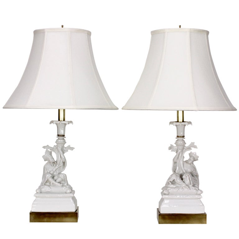 A Pair of Blanc De Chine Chinoiserie Lamps on Brass Plated Bases