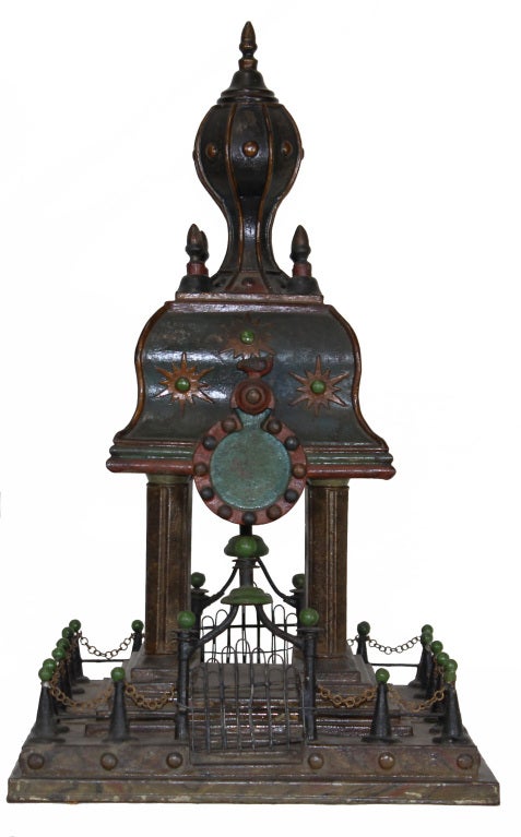 A painted metal watch hutch with fence posts, working gates, stepped platform and fluted columns. An awesome piece of folk art. This piece was found in Canada, but could be of Pennsylvania or Continental origin. Great paint and