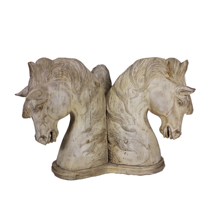 A large carved horse head table with very detailed mane, ears, eyes and mouth. Large scale with a 72