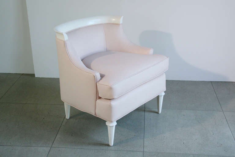 Pair of elegant bergere chairs in the manner of Dorothy Draper, c. 1950's USA. Newly reupholstered in Italian pale pink leather with newly lacquered wood legs and trim in bone. Very charming and elegant chairs, even more lovely in person.

Seat: