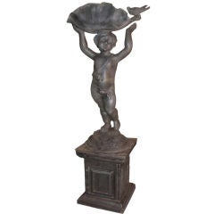 Cherub Holding a Shell
