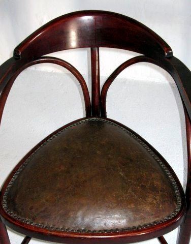 Model No. 81
Made by Thonet, impressed factory mark inside the frame
Mahogany stained beechwood
The seats are upholstered with the original brown leather (some traces of wear)

This avant-garde chair in itâ??s minimalist frame and construction