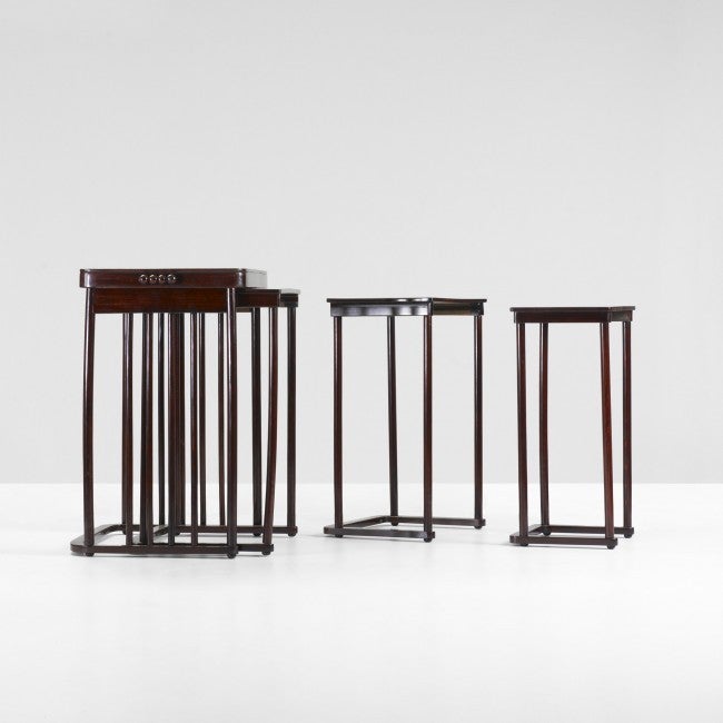 Designed by Josef Hoffmann and made by J. & J. Kohn, each one of this important set of four nesting tables, model no. 986, is stamped with the set no. 