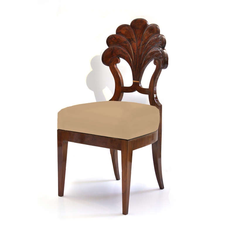 An important Biedermeier side chair from the Josef Danhauser workshop. The back features a palmette, a classic design motif that mimics a palm tree. The palmette is seen in classical styles, especially in the Biedermeier Neoclassical style of the