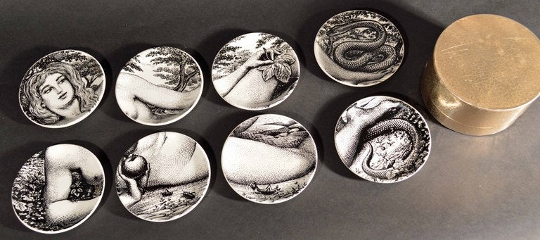 See: 
Fornasetti: Designer of Dreams, Patrick Mauriès, page 238, the author writes- The idea of dividing up the bodies of adam and Eve into twelve dinner plates is surely one that no one but Fornasetti.  They were made in 1954.  Each plate has its