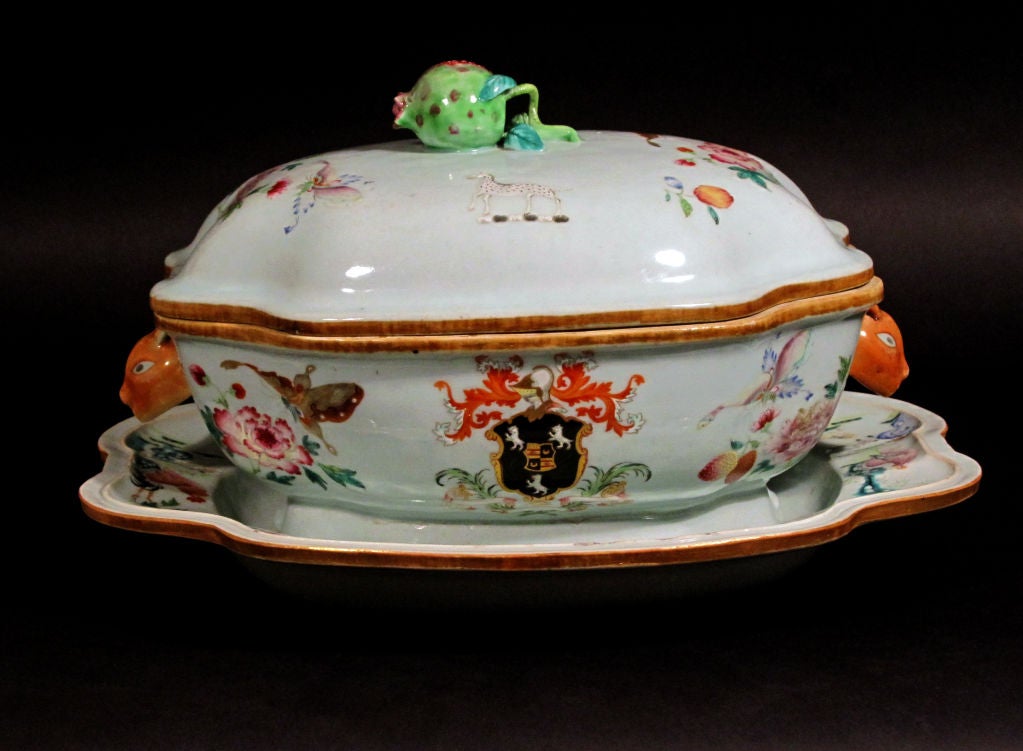 A Chinese Export Porcelain Armorial Tureen, Cover and Stand 1
