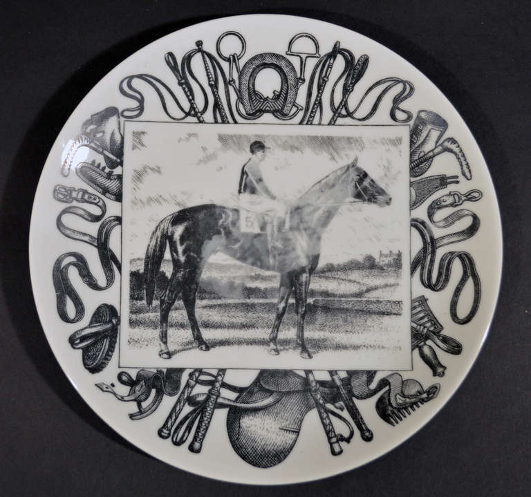 The plates, numbered consecutively from 1-6, are printed en grisaille and each depicting a famous Italian champion racehorse and jockey within a central rectangular panel surrounded by horse tack, boots and whips.

1-Ortello 1926
2- Archidamia