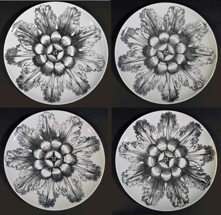 A Set of Four Piero Fornasetti Flower-Head Rosoni Plates