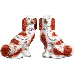 A Pair of Large Staffordshire Spaniels,  Signed & Dated 1867.