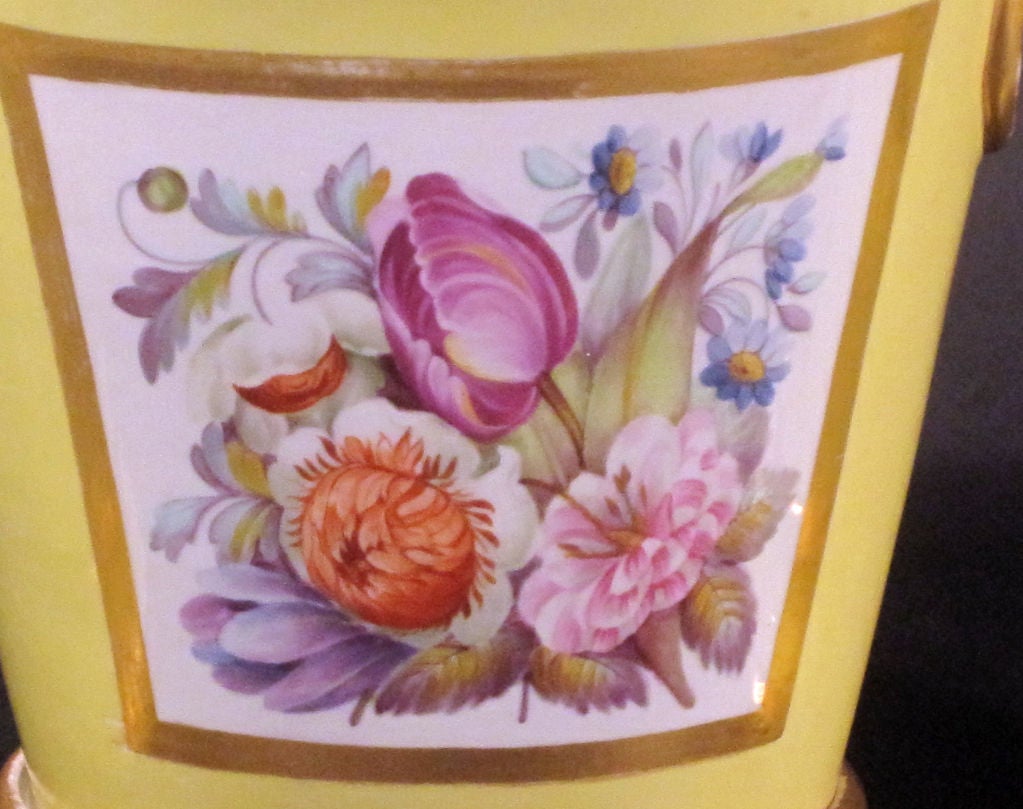 A Garniture of Three Coalport Yellow Cache Pots and Stands