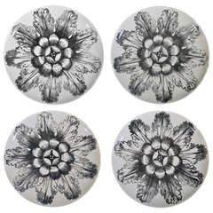 A Set of Four Piero Fornasetti Flower-Head Rosoni Plates