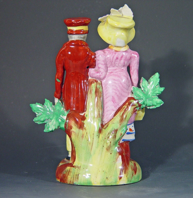 English An Early Staffordshire Figure of A Dandy and his Lady