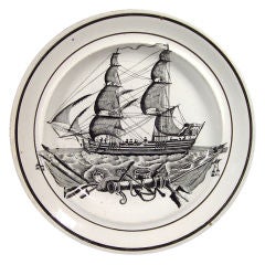 A Welsh Pottery Plate decorated with a Ship