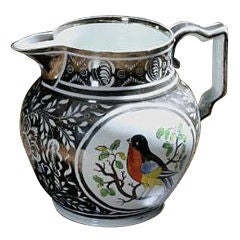 Antique An English Silver Lustre Jug decorated with a Robin