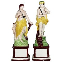Antique A Pair of English Pottery Figures of Neptune and Venus.